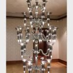 Elaborate chandelier made of glass video cameras.